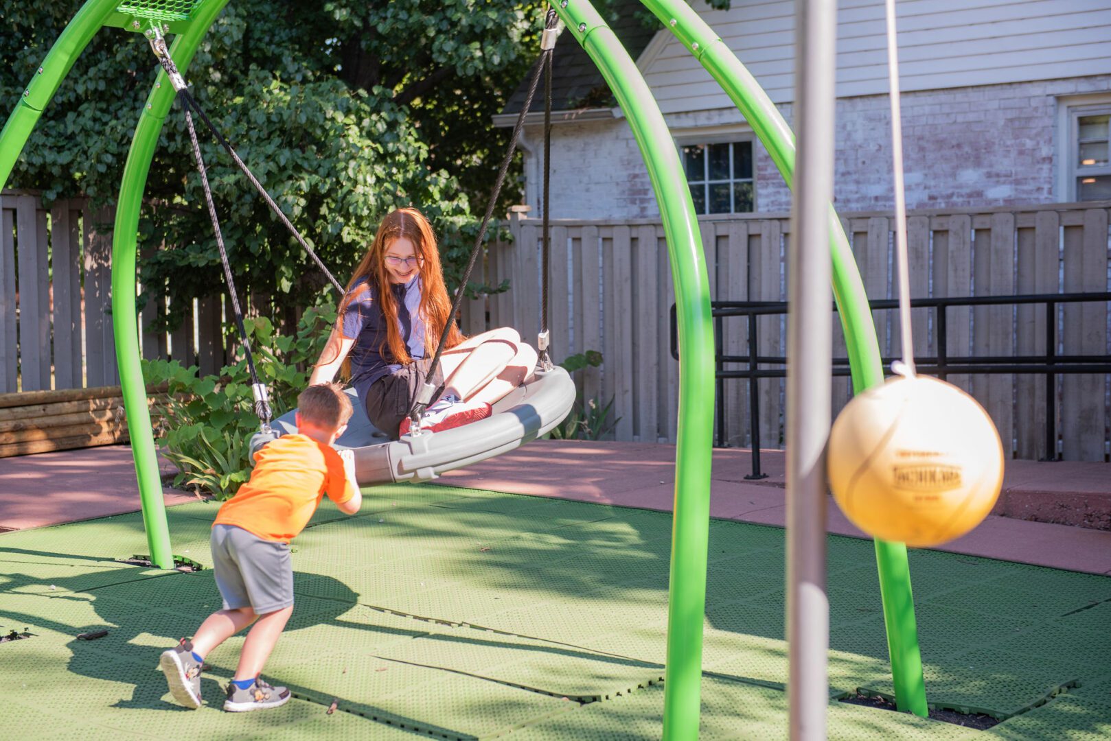 girl on large swing
